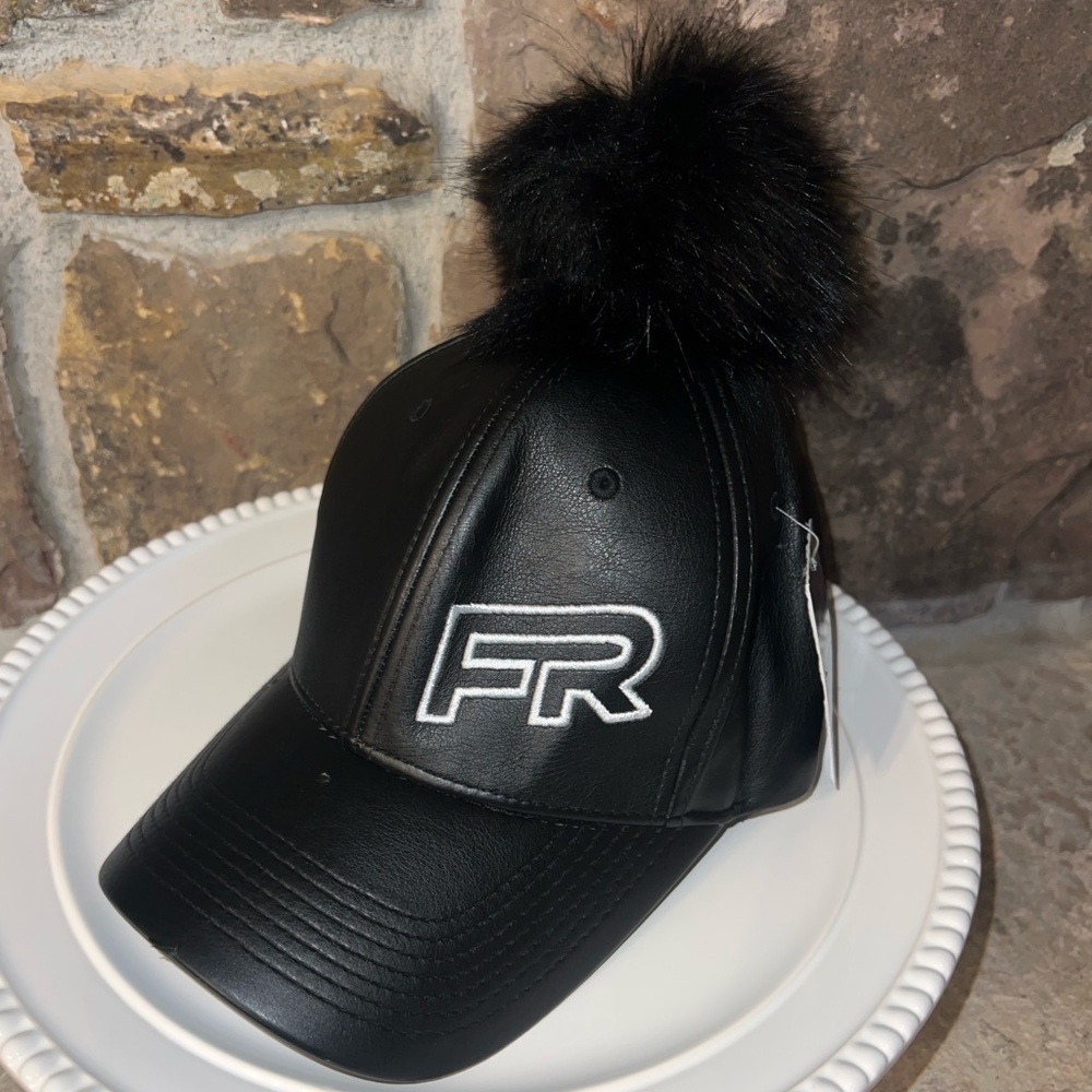 Black faux leather ball cap with Pom. By: Luxury Headwear.